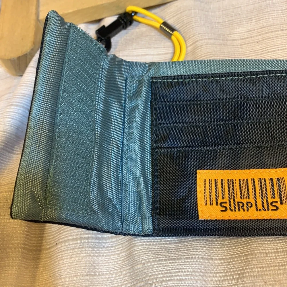 NWOT SurPlus foldable wallet w/bungee leash